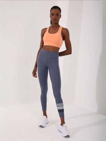 Tommy Life Sport top 'Aktive Oberteile' - narancs