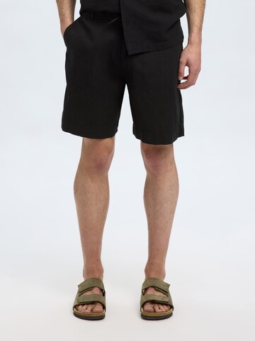 SELECTED HOMME Loose fit Pants 'SLHMAGNUS' in Black: front