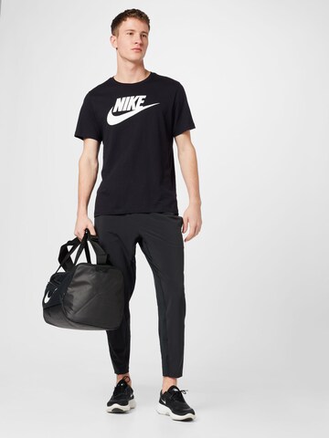 NIKETapered Sportske hlače - crna boja