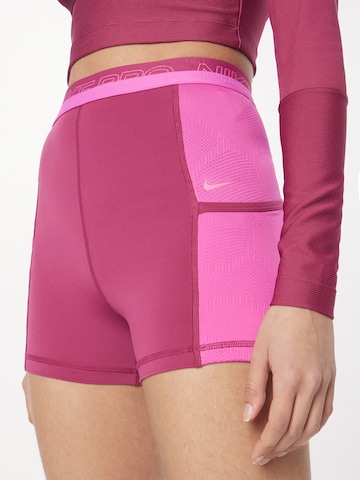 NIKE Slim fit Workout Pants in Pink