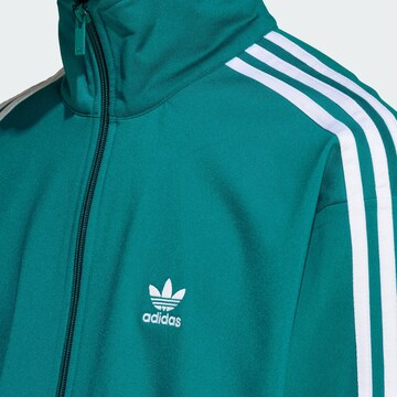 Veste de survêtement ADIDAS ORIGINALS en bleu