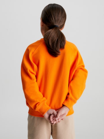 Calvin Klein Jeans Sweatshirt in Orange