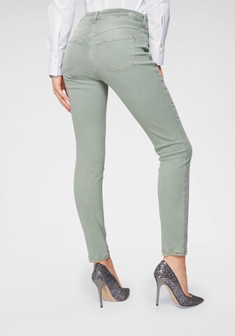 Skinny Jeans di MAC in verde