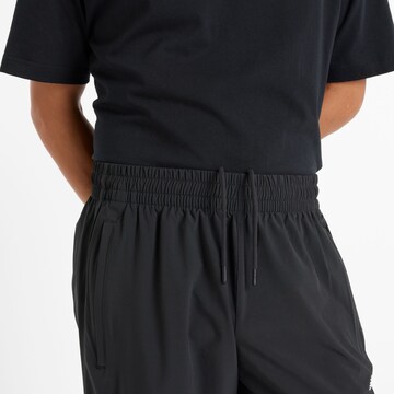 new balance Loose fit Pants 'In Game' in Black