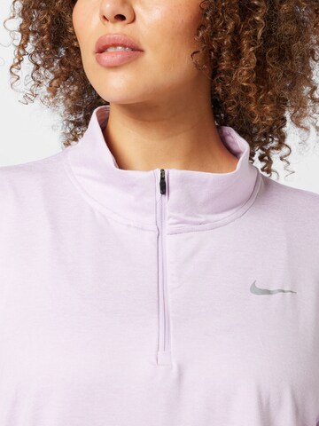 Nike Sportswear Performance Shirt in Purple