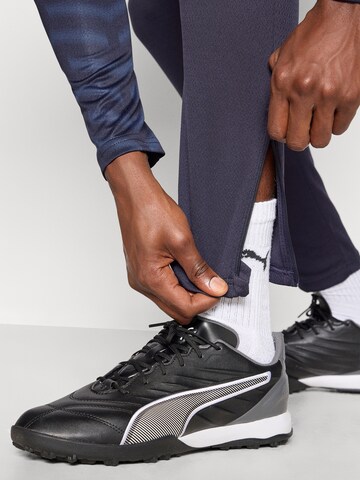 PUMA Regular Sports trousers 'Individual CUP' in Blue