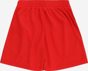 NIKE Loosefit Sportbroek in Rood