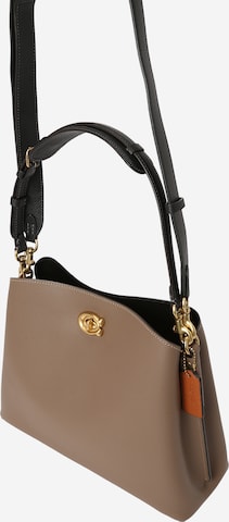 COACH Shoulder Bag in Brown: front