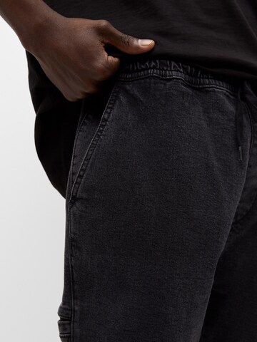 Pull&Bear Tapered Jeans in Zwart