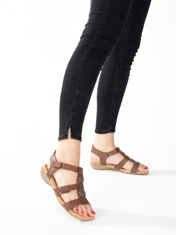 Minnetonka Sandalen 'Sonya' in Braun