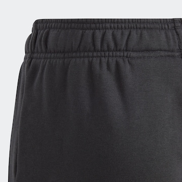 ADIDAS SPORTSWEAR Tapered Παντελόνι φόρμας 'Essentials' σε μαύρο