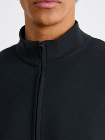 NIKE Sportsweatshirt in Schwarz