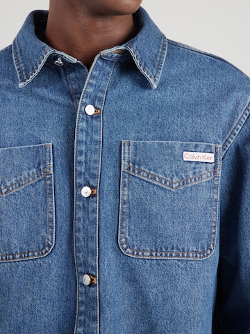 Calvin Klein Jeans Mugav suurus Triiksärk '90S HORIZON', värv sinine