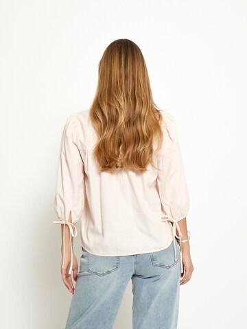 Peppercorn - Top 'Naima' en naranja