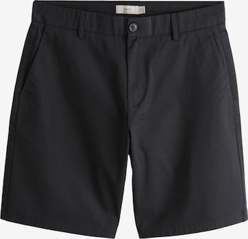 Pantalon chino Next en noir : devant