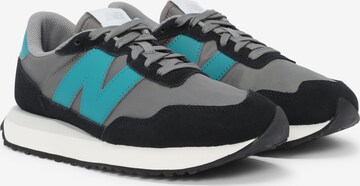 Baskets basses new balance en gris