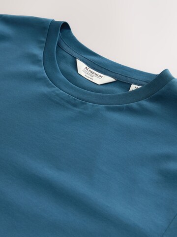 Tricou de la Next pe albastru