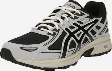 Baskets basses ASICS SportStyle en gris : devant