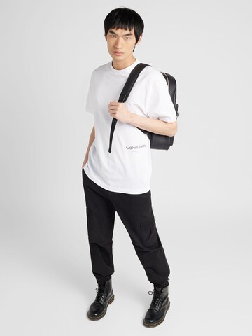 Calvin Klein - Camiseta 'OFF PLACEMENT' en blanco