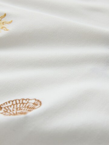 T-Shirt Next en blanc