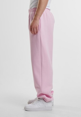 Effilé Pantalon 'Fluffy' Urban Classics en rose