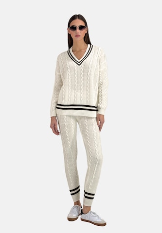 Elara Huispak in Beige: voorkant