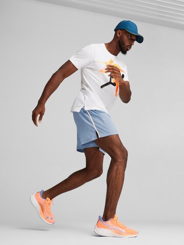 PUMAregular Sportske hlače 'RUN FAVORITE VELOCITY 5' - plava boja