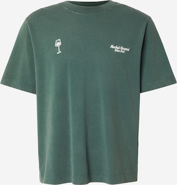 T-Shirt 'WELLNESS DESTINATIONS' Abercrombie & Fitch en vert : devant