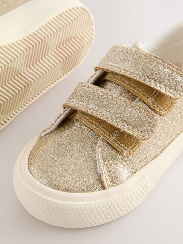 Next - Zapatillas deportivas en oro