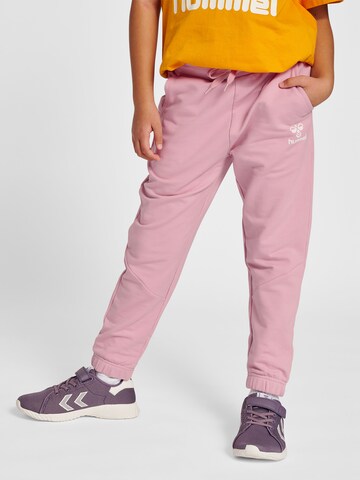Hummel Tapered Pants 'NUTTIE' in Pink: front