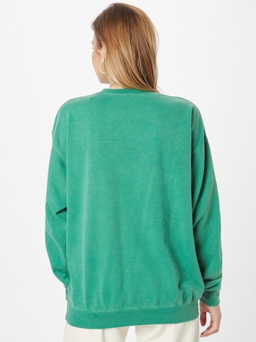 Sweat-shirt 'Cool Girls Club' Nasty Gal en vert