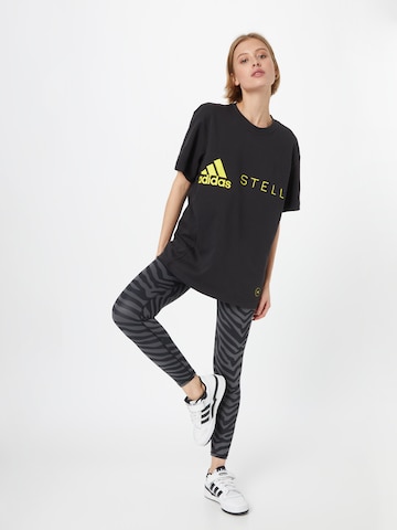 ADIDAS BY STELLA MCCARTNEYTehnička sportska majica 'Logo' - crna boja