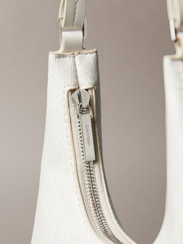 Sac bandoulière Calvin Klein en beige