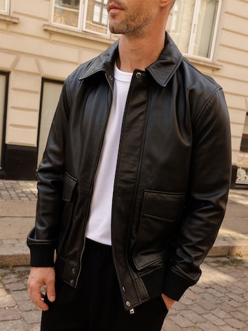DAN FOX APPAREL Демисезонная куртка 'Torben' в Черный
