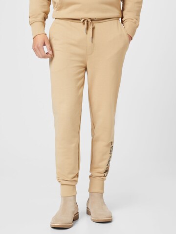 Effilé Pantalon Calvin Klein Jeans en beige : devant