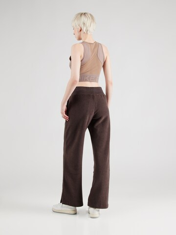 Nike Sportswear Wide leg Trousers 'PHNX' in Brown