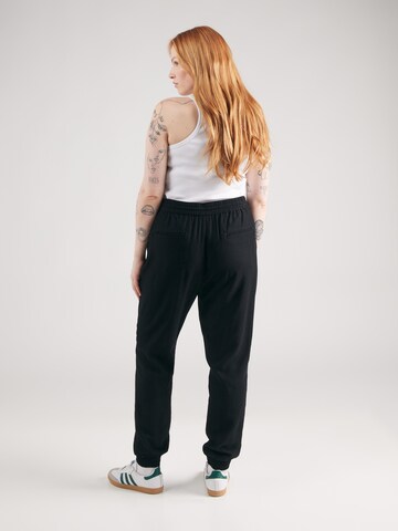 ONLY Carmakoma Tapered Trousers 'CARKELDA-EMERY' in Black