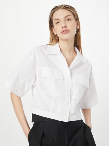 3.1 Phillip Lim - Blusa em branco: frente