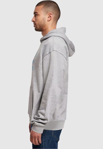 Merchcode Sweatshirt 'NITM - Italic' in Grau