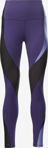Reebok Skinny Spodnie sportowe w kolorze fioletowy: przód