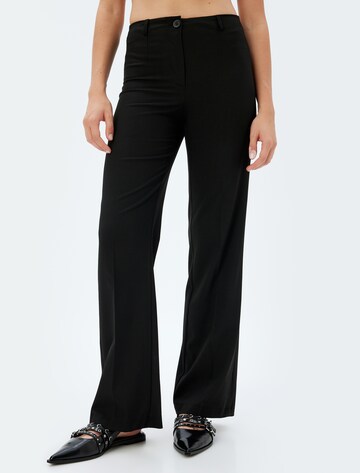 Koton Wide leg Trousers with creases in Black: front