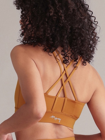 Hey Honey - Bustier Sujetador deportivo 'Criss Cross' en naranja