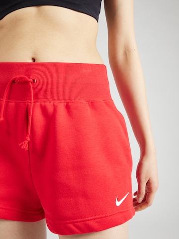Nike Sportswear Ohlapna forma Hlače 'Phoenix Fleece' | rdeča barva