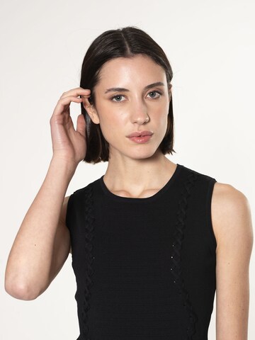 Top in maglia di Influencer in nero