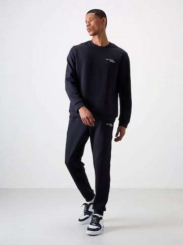 Tommy Life Joggingpak in Blauw: voorkant
