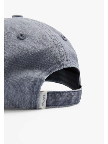 Scalpers Muts ' ' in Blauw: terug