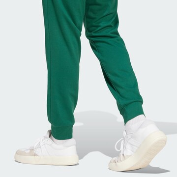 ADIDAS SPORTSWEAR Tapered Παντελόνι φόρμας 'Essentials Feel Cozy' σε πράσινο