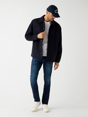 GUESS Skinny Jeans 'Adam' in Blau