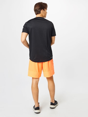 ADIDAS PERFORMANCE Loosefit Sportovní kalhoty – oranžová