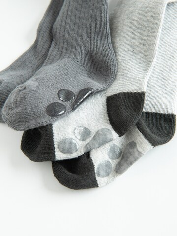 Cool Club Sukkahousut värissä harmaa